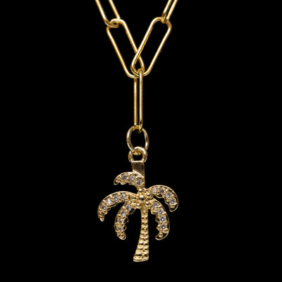 yellow gold over sterling silver paperclip necklace with cubic zirconia palm tree charm