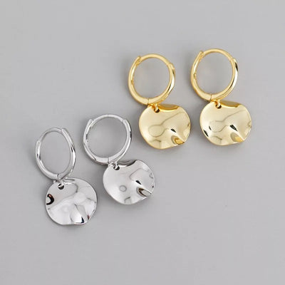 hoop earrings in yellow gold over sterling silver or sterling silver with  reflective disks